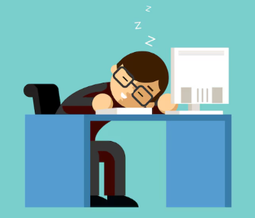 employee slepping on desk